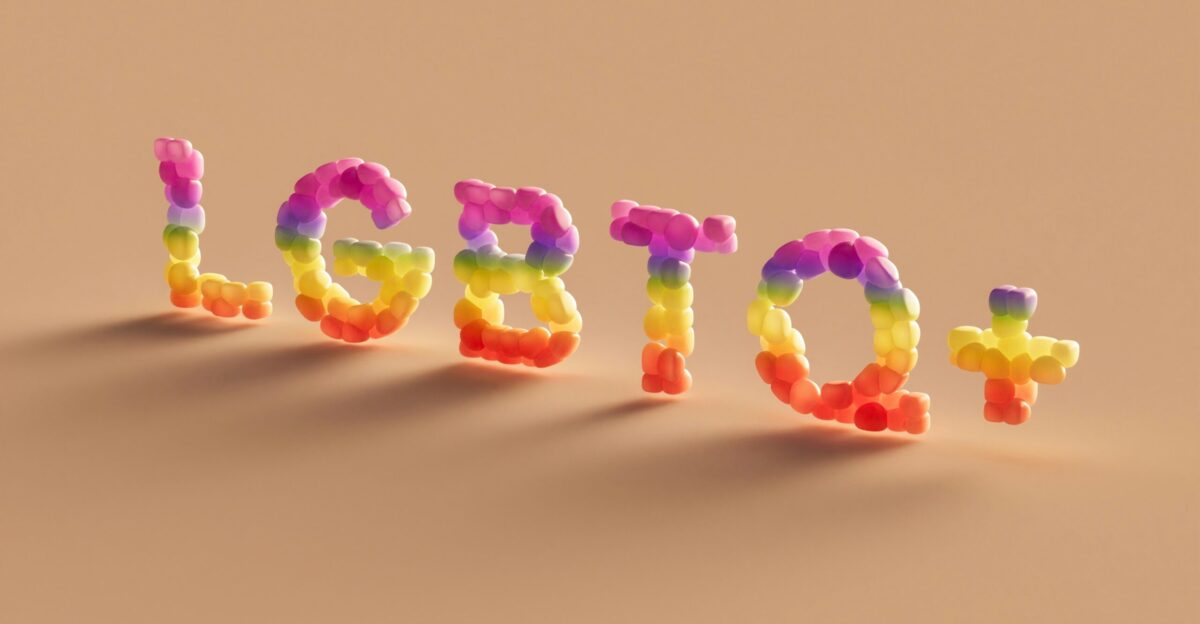 a word made out of plastic letters on a brown background