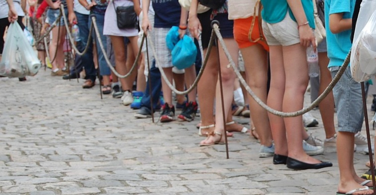 people foot waiting line queue crowd street gray crowd gray street queue queue queue queue queue