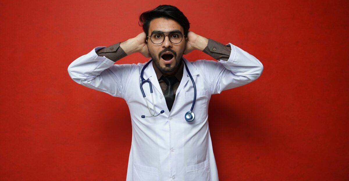 a man wearing a white lab coat