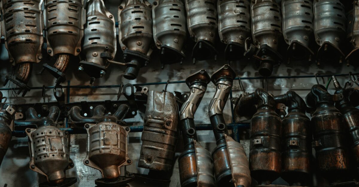 A bunch of metal objects hanging on a wall