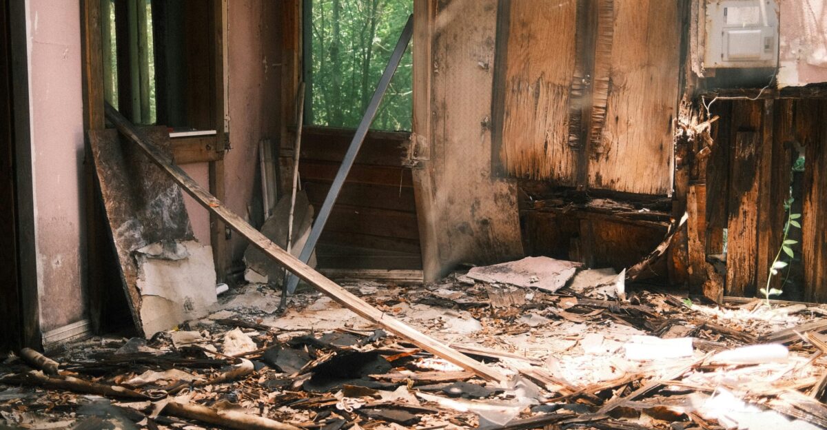 A burned and damaged room is shown