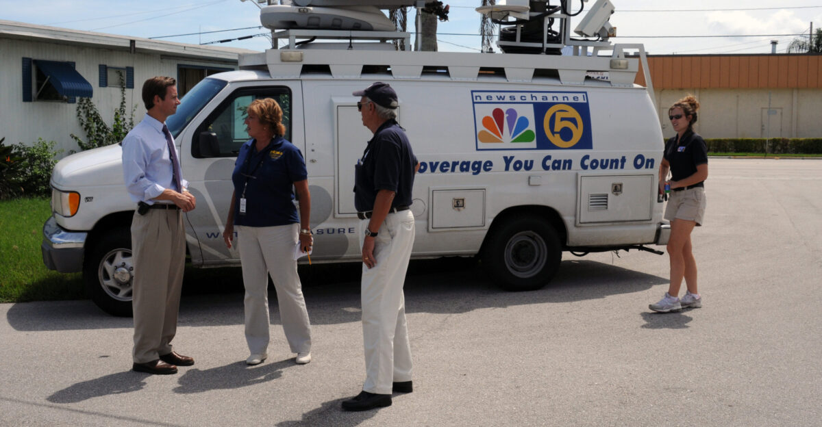 Ft Pierce FL September 16 2008 - FEMA Public Information Officer PIO Renee Bafalis and Community Relations CR Specialist Rene Haldimann speak with WPTV-TV 5 news crew who are here to accompany them on a CR outreach in this Tropical Storm Fay impacted neighborhood George Armstrong FEMA