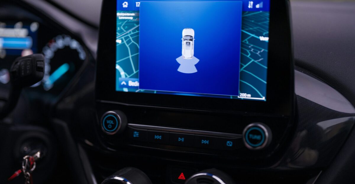 The dashboard of a car with a gps