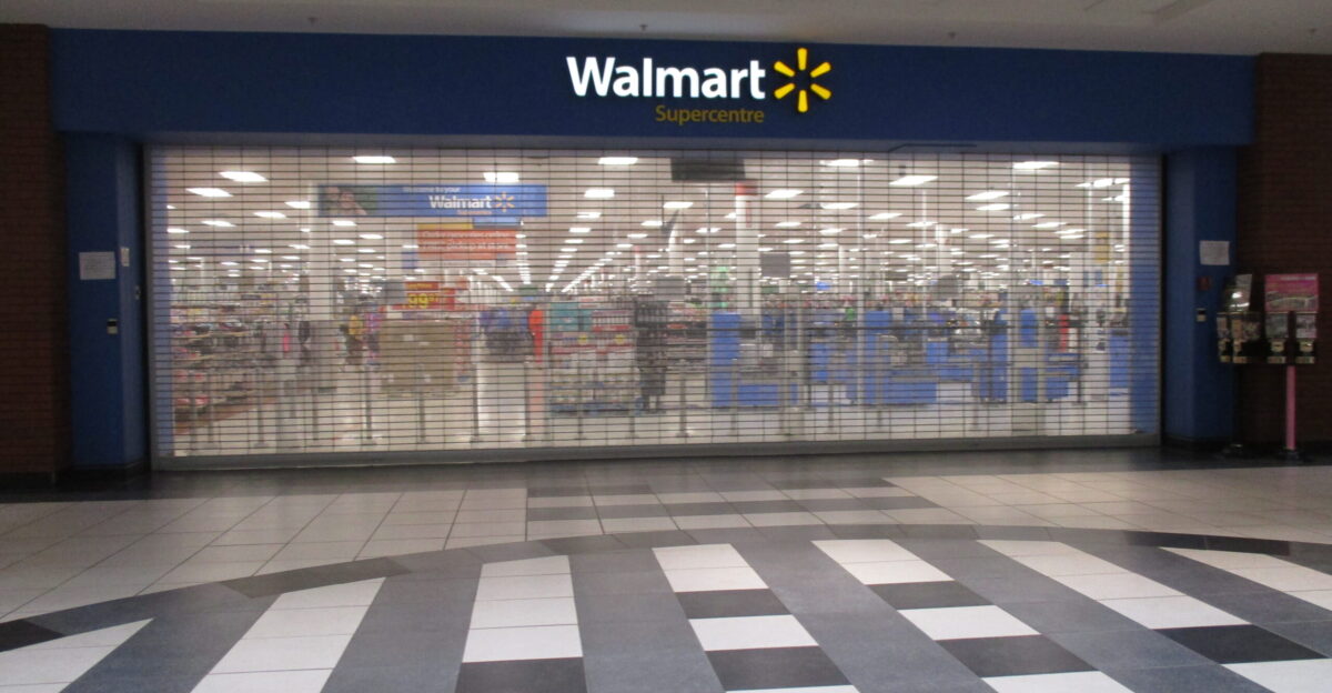 Walmart in Northgate Centre in Edmonton Alberta The security doors are shut but the service is open