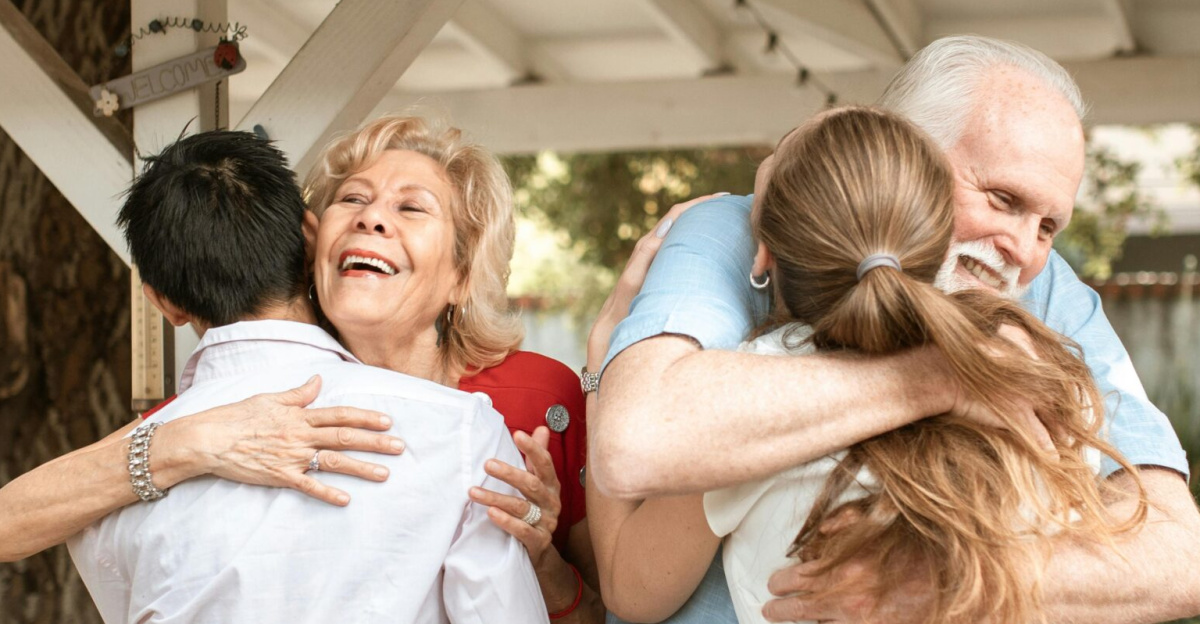A joyful family reunion outdoors with warm hugs and smiles under a wooden pergola.